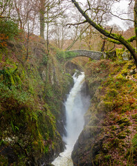 Aira Force Waterfall in the Lake District and bridge over it.