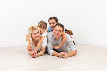 Portrait of a happy family smiling at home