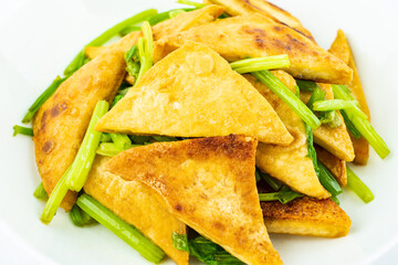 A dish of dried tofu with celery