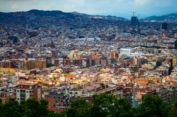 Barcelona, Spain - July 27, 2019: Aerial view of Barcelona city on a cloudy day in Catalonia, Spain.