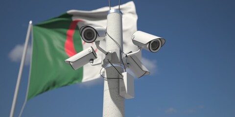 Naklejka na ściany i meble Waving flag of Algeria and the security cameras. 3d rendering