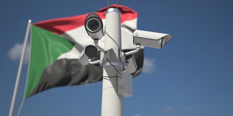 Naklejka na ściany i meble Security cameras near flag of Sudan, 3d rendering