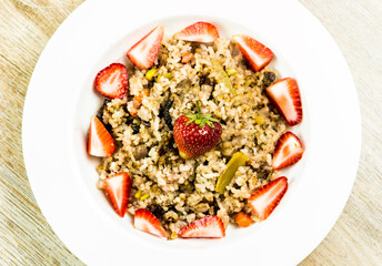 Baked rice with strawberries in plate, in studio Chiangmai Thailand
