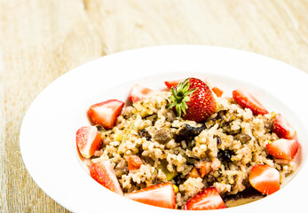 Baked rice with strawberries in plate, in studio Chiangmai Thailand