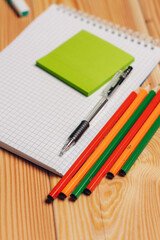 notepads pencils office work paper wood background