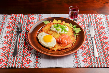 Healthy breakfast fried egg on a plate, healthy food. Ukrainian cuisine concept.