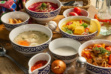 A large set of soups, Borscht, lagman, shurpa, chicken broth and fish soup.