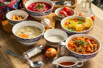 A large set of soups, Borscht, lagman, shurpa, chicken broth and fish soup.