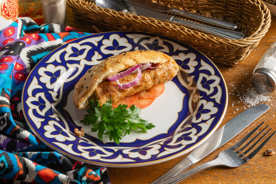 Doner kebab with tomatoes, onions and parsley wrapped in pita