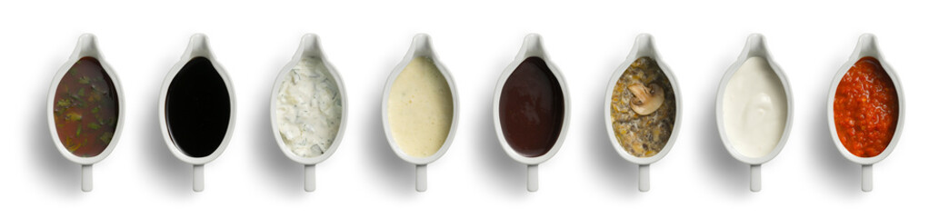 Set of several different sauces on a white background