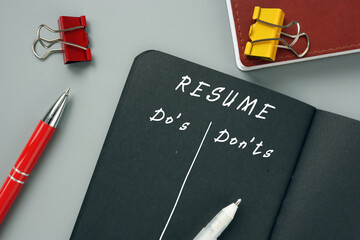  RESUME Do's and Don'ts phrase on the piece of paper.