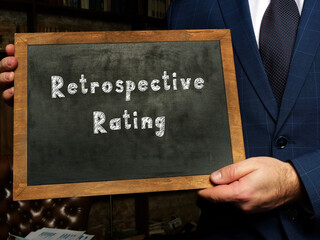 Business concept about Retrospective Rating with inscription on the black chalkboard.