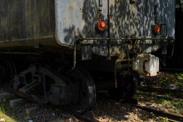 Close up back view of old rustic train park as long time ago in public park in Japan.Demonstrate train parking on railway in vintage retro style from old century.