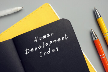  Financial concept meaning Human Development Index with inscription on the page. © Yurii Kibalnik