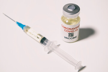 Covid-19 coronavirus vaccine and syringe