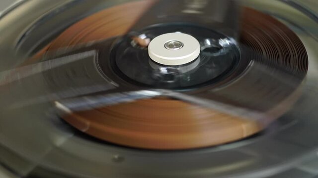 Old vintage reel-to-reel player. Tape recorder with spools. Bobbin tape recorder.	