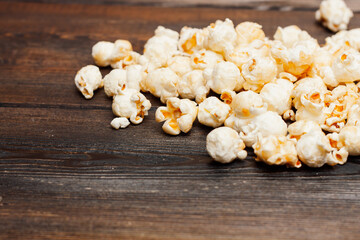 popcorn on a wooden table snack classic delicacy entertainment