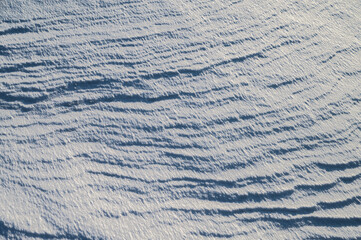 Natural abstract background. Snow surface.