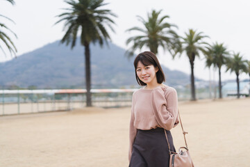 Fototapeta premium 公園の女性