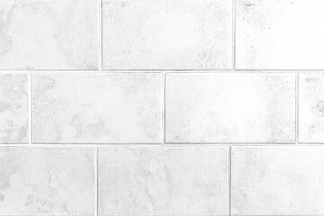 Fototapeta premium Vintage white granite building tile wall texture and background seamless