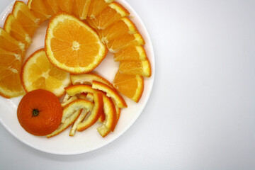 Juicy orange slices on a white background. Vitamin C.