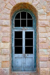 Fototapeta na wymiar Old vintage blue wood door ,Building entrance and brown stone wall