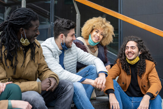 Group Of Millennial Friends Chatting Together And Having Fun, Universitary Students From Different Ethnicity Smiling, Joking And Laughing