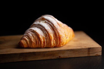 Freshly baked croissants. Warm Fresh Buttery Croissants on a tray