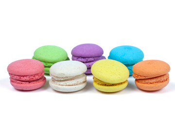Fototapeta na wymiar Colorful macaroons is a french sweet delicacy isolated on white background.