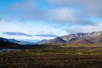 Obraz na płótnie Canvas View over the Berserkerjahraun lava field with the mountains Kothraunsúla and Seljafell (right) and the lake Selvallavatn at the Selvellir valley on the Snæfellsnes peninsula in western Iceland.