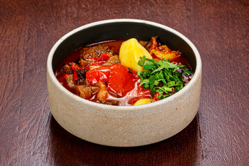 Tasty soup with vegetables and herbs