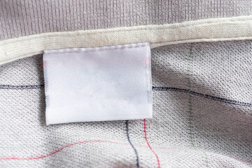 laundry care clothing label on fabric texture
