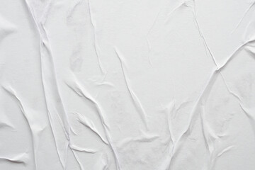 Blank white crumpled and creased paper poster texture background