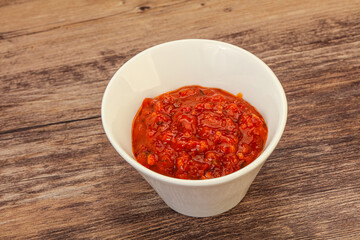 Obraz na płótnie Canvas Tomato spicy sauce in the bowl