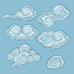 Hand-drawn decorative blue clouds set