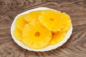 Marinated pineapple rings in the bowl
