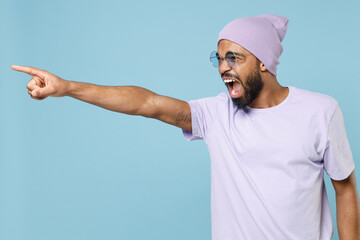 Young angry indignant strict unshaven student black african man 20s inviolet t-shirt hat glasses...