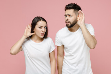 Young cheerful couple two friends bearded man brunette woman in white basic blank print design...