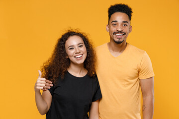 Young couple two american friends family happy satisfied smiling african man woman 20s together in...