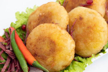 Detailed Closeup Of Aloo Tikki Also Known As Alu Ki Tikkia A Seasoned Boiled Mashed Potato Cutlet...