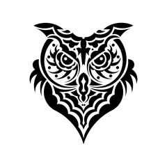 Obraz premium The face of an owl from the Maori patterns. Isolated on white background. Vector illustration.