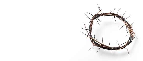 Crown of thorns isolated on white background. Top view. Copy space. Christian Easter concept....