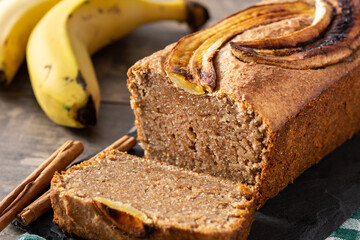 Homemade banana bread on wooden table