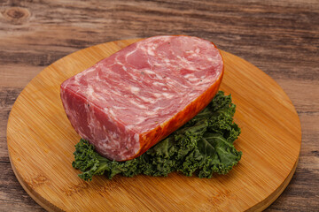 Beef ham piece over board