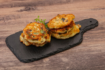 Zucchini pancakes with herbs and spices