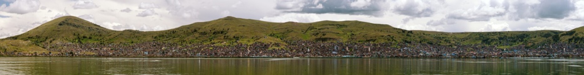 Puno city and Titicaca lake panoramic view from Peru