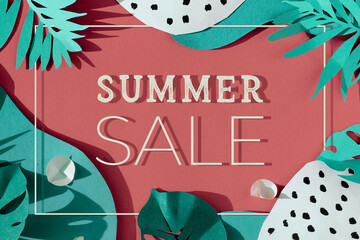 Text Summer Sale on trendy paper flat lay. Top view with decorative exotic palm and monstera...