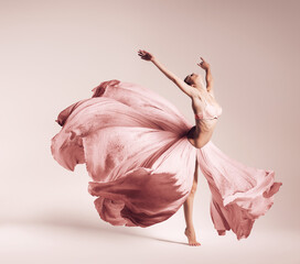 ballerina dancing in flowing pink dress