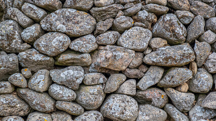 Handmade stone fence with contrast