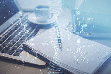 Double exposure of DNA drawing and desktop with coffee and items on table background. Concept of medical science education